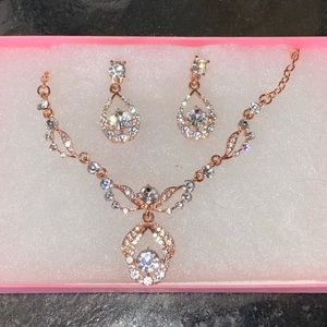 Rose gold plated with Swarovski Crystal accented wedding jewelry set.